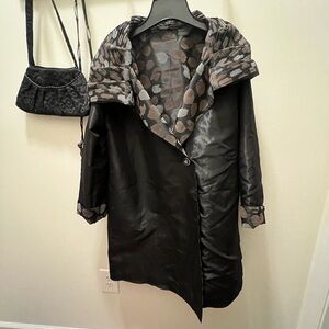 Stylish Black Reversible Women's Rain Coat with Patterned Accents